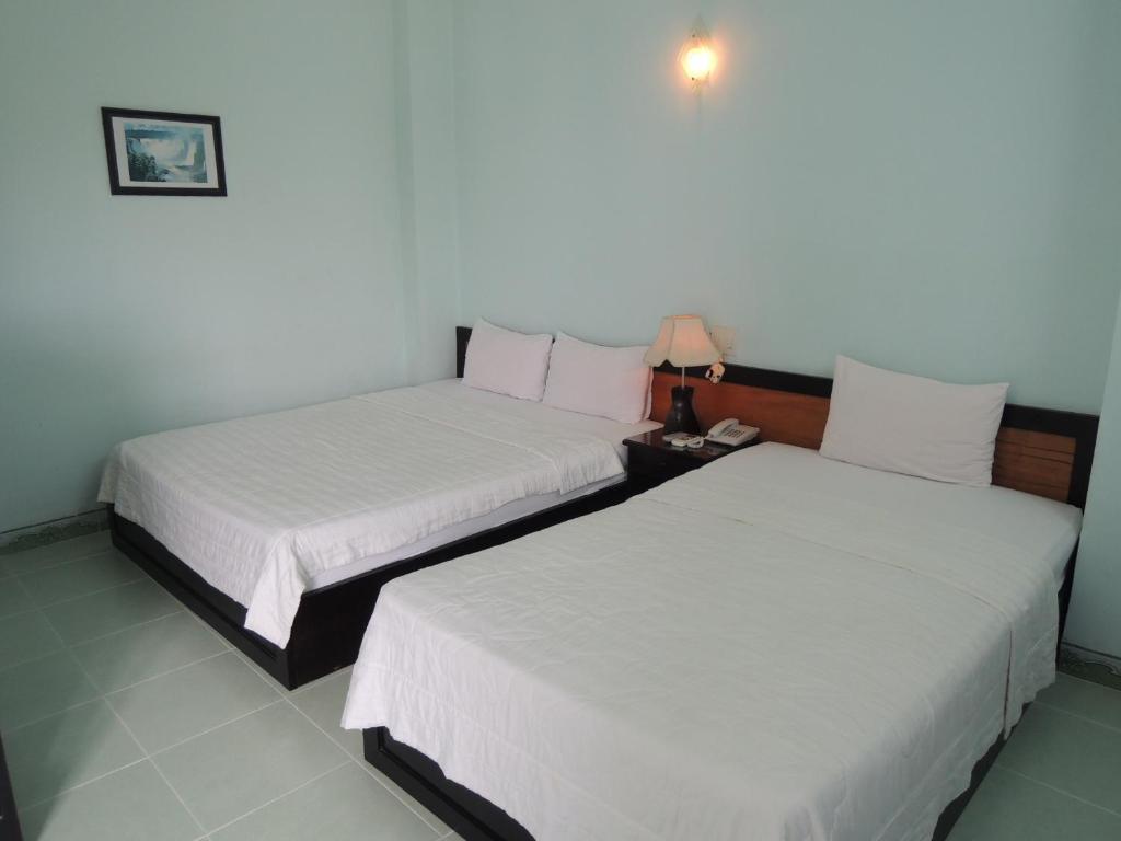 Four Seasons House Hotel Nha Trang Quarto foto