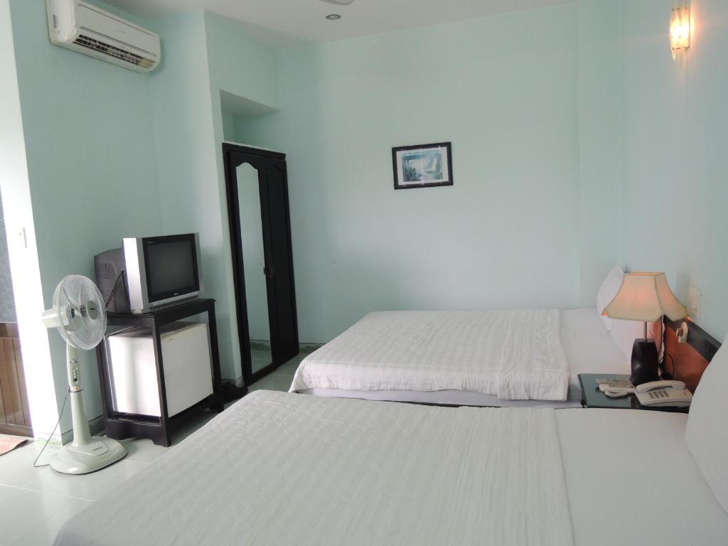 Four Seasons House Hotel Nha Trang Quarto foto