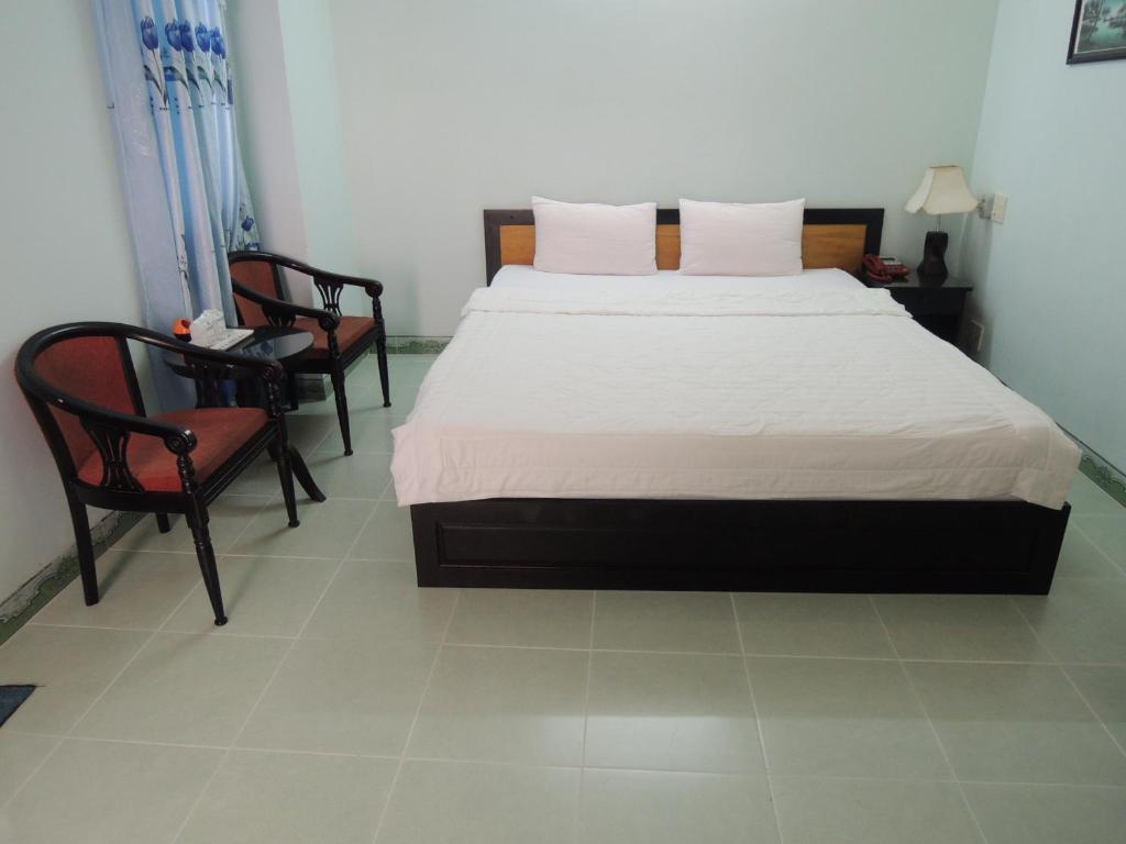 Four Seasons House Hotel Nha Trang Quarto foto